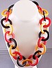 BN17 red,cream, black round link bakelite necklace